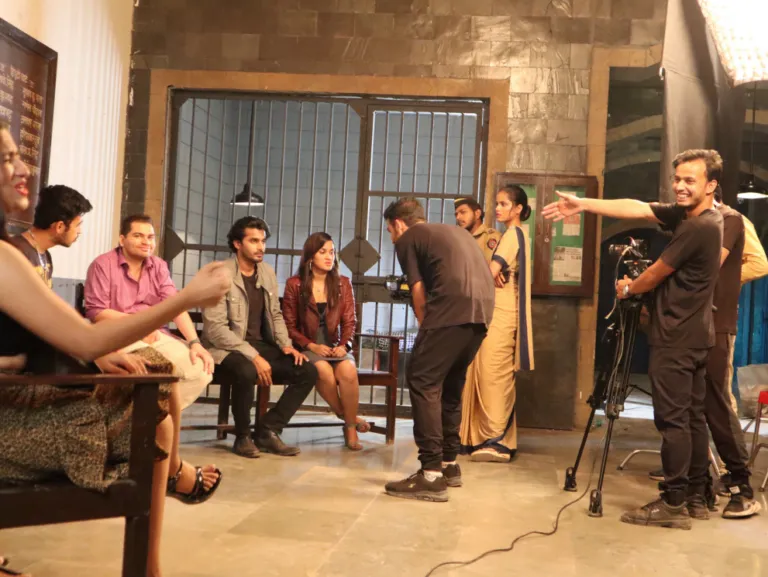 students-practicing-shooting-scene